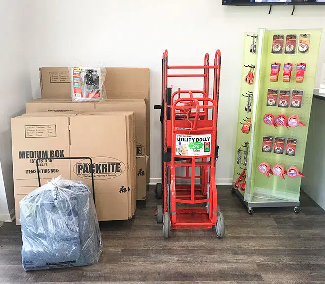 Cardboard moving boxes and packing tape supplies at Storage Solutions Plus in Houston.