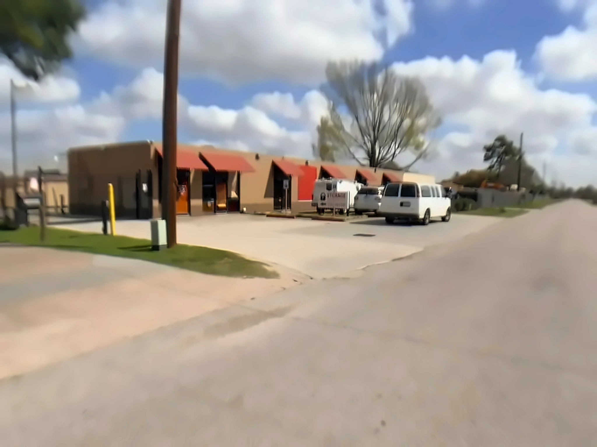 Boat and RV storage lot with covered parking spaces